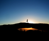 Kelly running in Canyonlands NP at sunrise