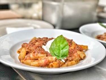 https://media-cdn.tripadvisor.com/media/photo-f/12/06/8d/c6/rigatoni-bolognese-sauce.jpg