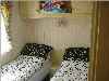 twin bedroom in holiday caravan by the seaside at skegness 