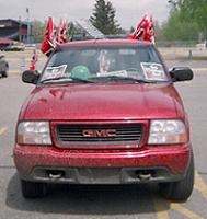 Now, some people had one or two of those Flames flags on their cars... this guy had more than his fair share!