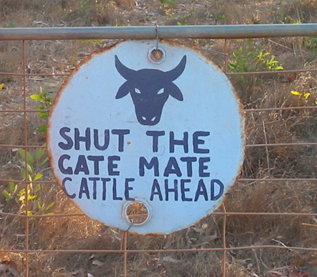 Sign on gate