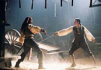 Cap'n Jack and Will fencing in the smithy