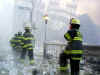 2473681_t_c_feuerwehr_in_den_truemm.jpg (12221 Byte)