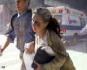 2473797_trade_center_fliehende_frau.jpg (11566 Byte)