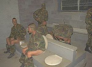 Military Men Using Communal Toilets Military Men Using Communal Toilets