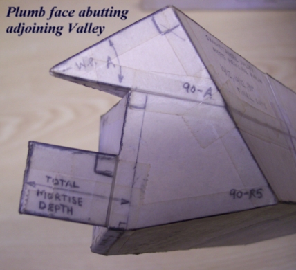 Model of Valley Rafter Peak with Shelf Cut, Tenon and Layover Extension ... view of plumb face abutting opposite hand Valley