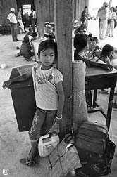 Young girl evacuee fleeing from militarized area