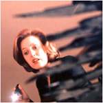 Scully busca a su compa�ero... en el piso de abajo