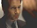 Scully recuerda una conversación con Mulder en el ascensor del FBI