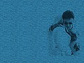 Crowe on a couch in blue.