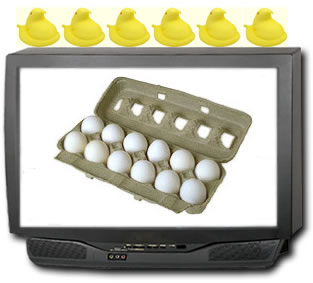 An egg carton on a TV screen and Peeps sitting on top