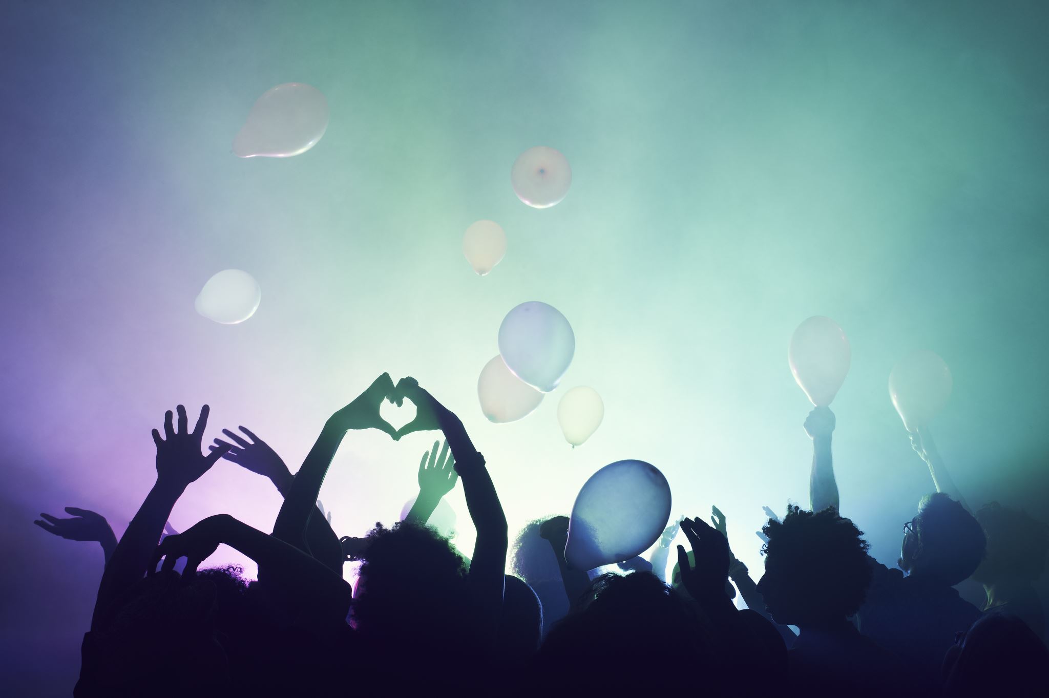 Group of people having fun at music concert