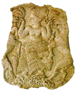 Beautiful Goddess, carved in ivory, in Cretan-style skirt with ibexes on either side