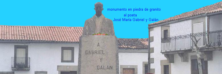 Estatua en piedra de granito del poeta José María Gabriel y Galán, en el centro de la Plaza de España, en Guijo de Granadilla -- foto hecha por Jesús Herrera el domingo 13 de abril de 2003