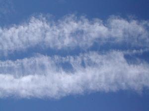 this was a thick band that streched from horizon to horizon.  This is no little jet trail.  I can't imagine how this formed.