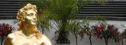 Sure, she can represent language.  What the heck!  This is actually a golden fountain at mad king Ludwig's castle Linderhof in Bavaria, Germany.