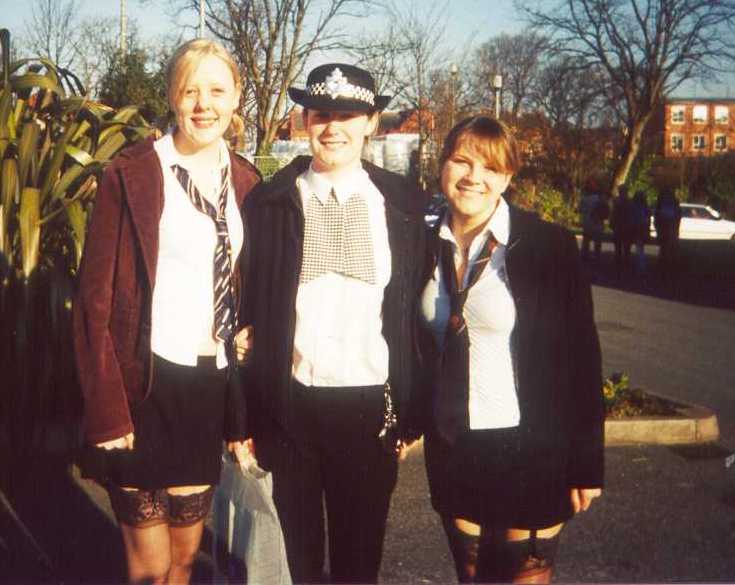 Me and Sarah as St Trinian girls rounded up by Elaine the policewoman!