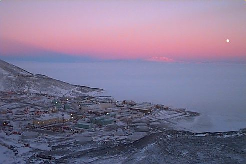 Town in pathed in pink twilight