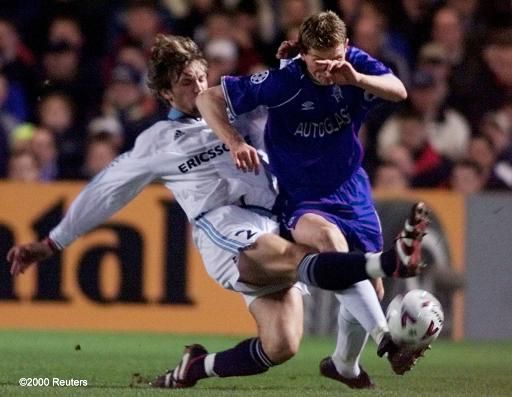 Tore-Andre Flo is taken down by Jacques Abaradonado.