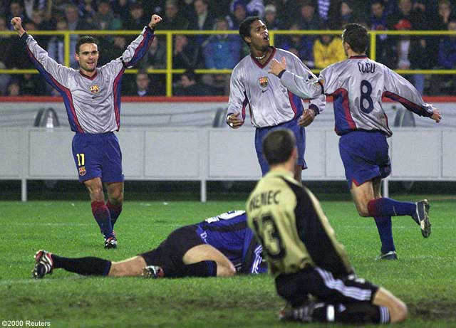 Overmars, Kluivert and Cocu celebrate a goal.