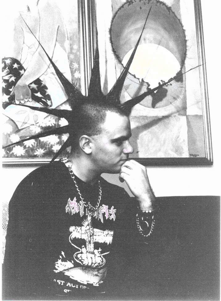Me when i had a mohawk...ahhh to be young..anyone else have any pics of me with a hawk?????