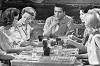 Chad (Elvis) meets Miss Prentice and her students in Blue Hawaii