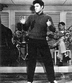 Vince (Elvis) sings (Your So Square) Baby I Don't Care