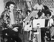 Elvis rehearsing with the Sweet Inspirations