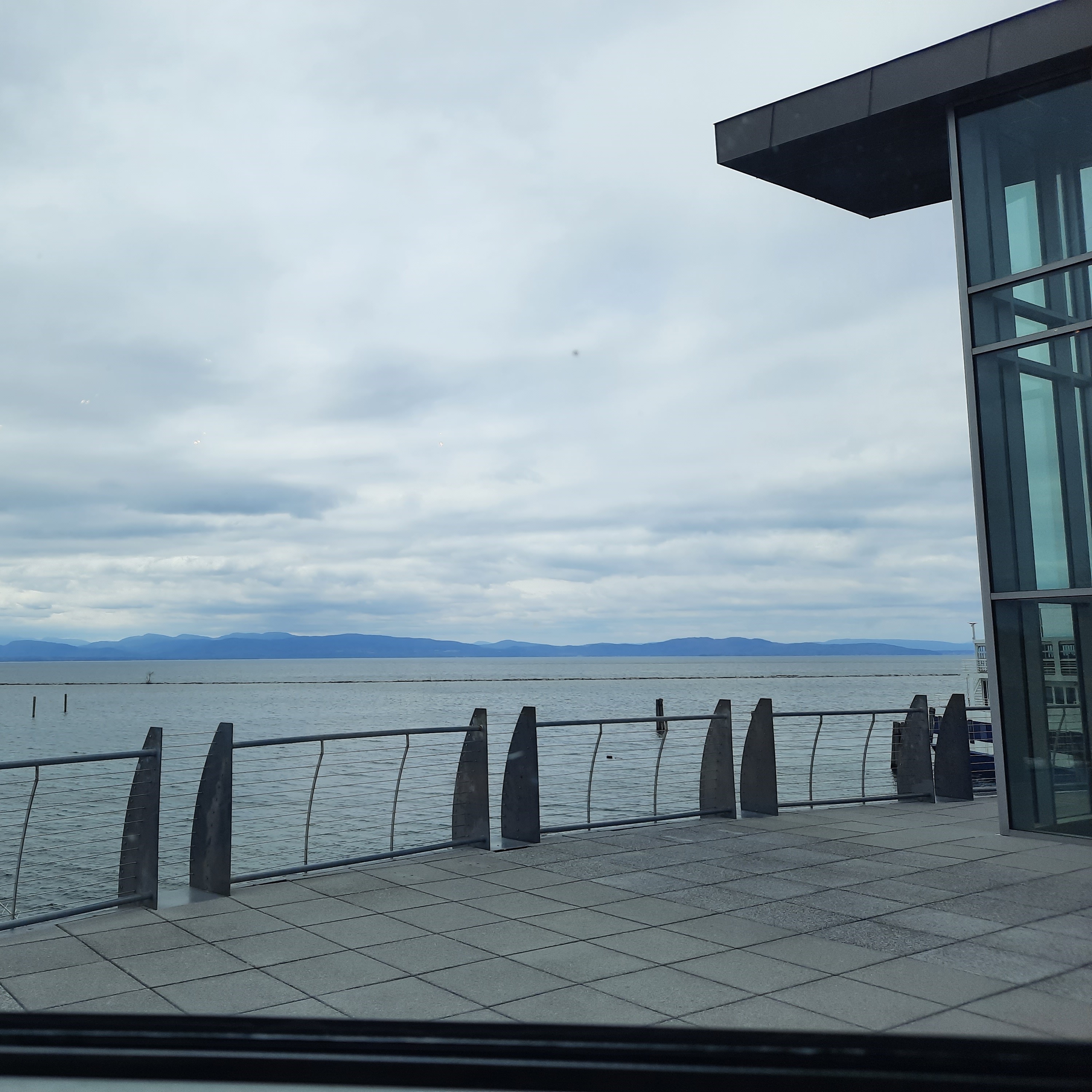 a cloudy view of a lake