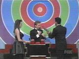 Two contestants ready themselves for Bullseye