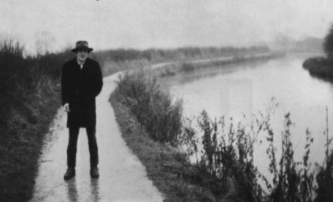 Strummer near canal