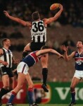 Sav Rocca marking during his Magpie days