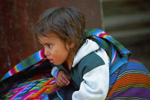 Baby in his Mother's back ... Chichicastenango