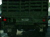 military vehicle - no plates, screened number
