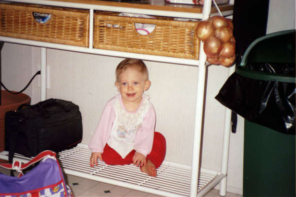 Shelby under the baker's rack!