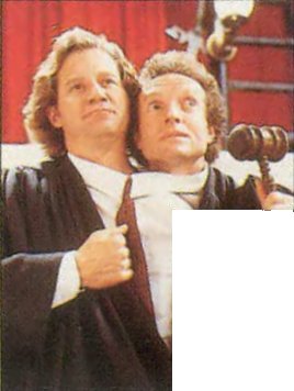 The Judgeheads. Joe Clark has taken Wayne Winstead's place while he appears in the courtoom as a Barbershop Singer.