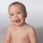 cute baby sticking his tongue out