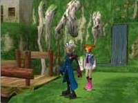 Two partners walking though a green area with a lot of foilage