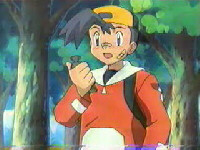 A trainer looks at his pok�naf upon receiving a call