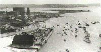 Fishermans Dock looking east, showing old Lifeboat station, Gasworks and Baiter Peninsular c1930s