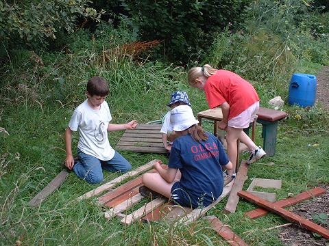 Junior engineers at work on their treehouse August 2002