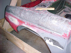 the messy work of stripping paint