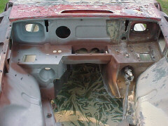 left side sandblasted with spotted rust preventive primer