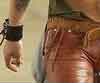 Brown leather pants by a fashion model