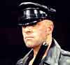 leather cop with baton