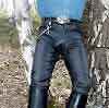 Leather pants and blue denim shirt