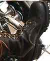 laced loggers on machine