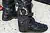 UK cop with handcuffs at boot