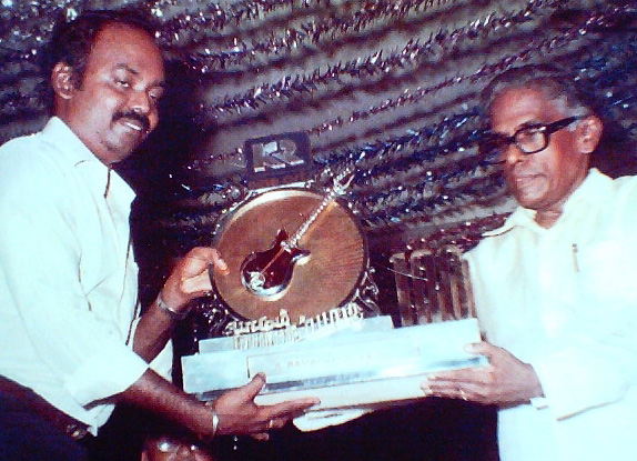 Receiving Memento from Tamil Nadu Minister Rm.Veerappan