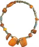 Bronze Age necklace made of amber faience and tin, found at Exloo, the Netherlands